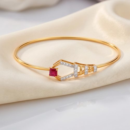 Luxury Crafted Diamond Bangle Featuring Vibrant Ruby Stones in 18K Yellow Gold by Bafleh Jewellery