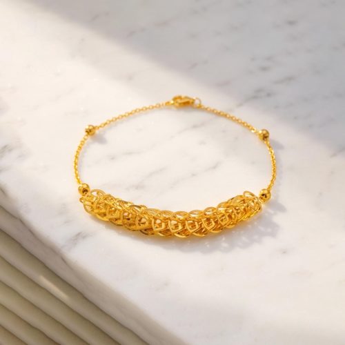 21K gold bracelet with a bold woven centerpiece comfort and the perfect luxury gift by Bafleh Jewellery
