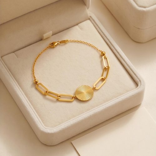 21K lightweight gold bracelet featuring a radiant textured sunburst heart charm and modern paperclip links crafted for effortless everyday luxury by Bafleh Jewellery