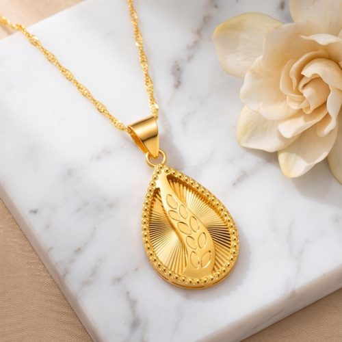 Elegant 21K Gold Pendant with Chain  Now Available at Bafleh Jewellery
