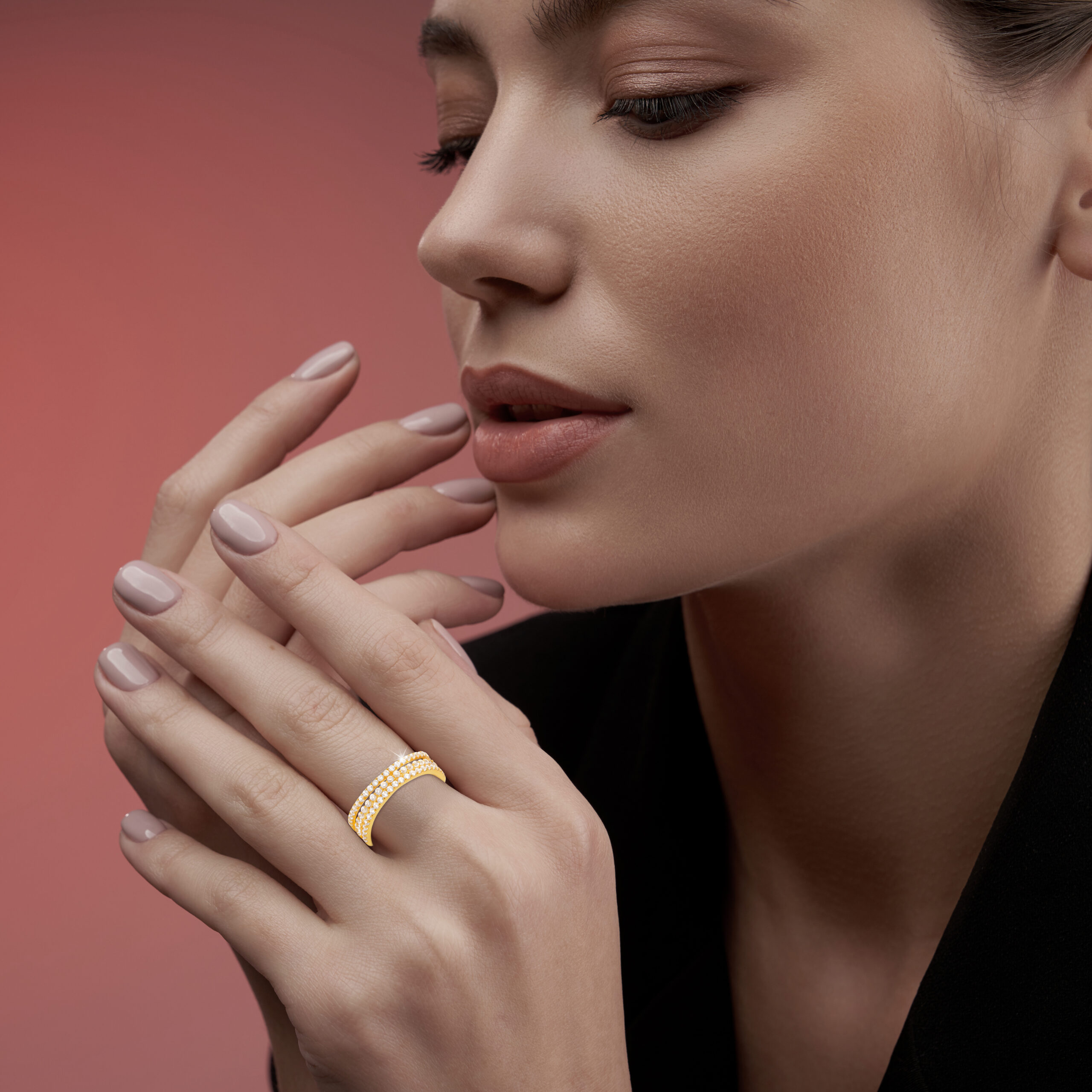 Pretty model demonstrating expensive jewelry.