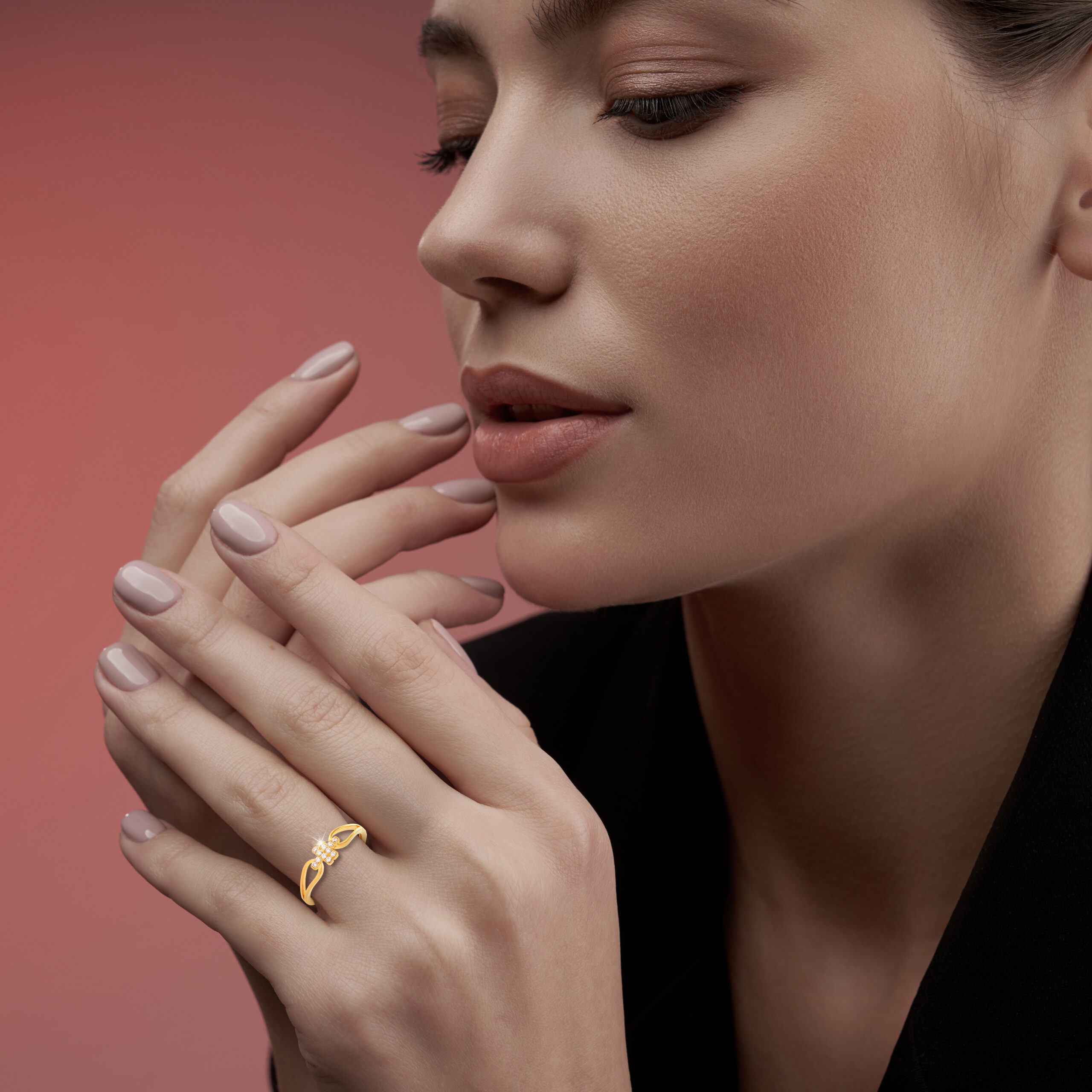 Pretty model demonstrating expensive jewelry.