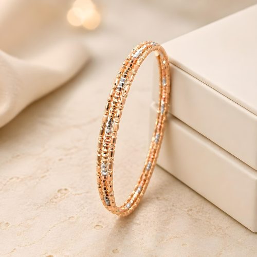 Make Every Moment Sparkle with the Elegant 18K Gold Spring Bangle with Beats Design Available at Bafleh Jewellery