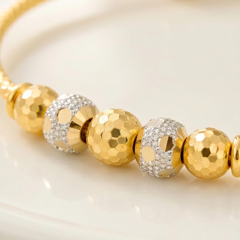 Alternative view of Bafleh Jewellery 21K Two Tone Gold Expandable Baby Bangle with Faceted Beads