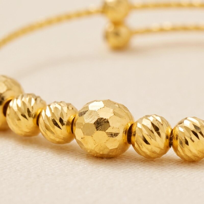 Alternative view of 21K Bafleh Gold Expandable Baby Bangle featuring Alternating Textured Beads