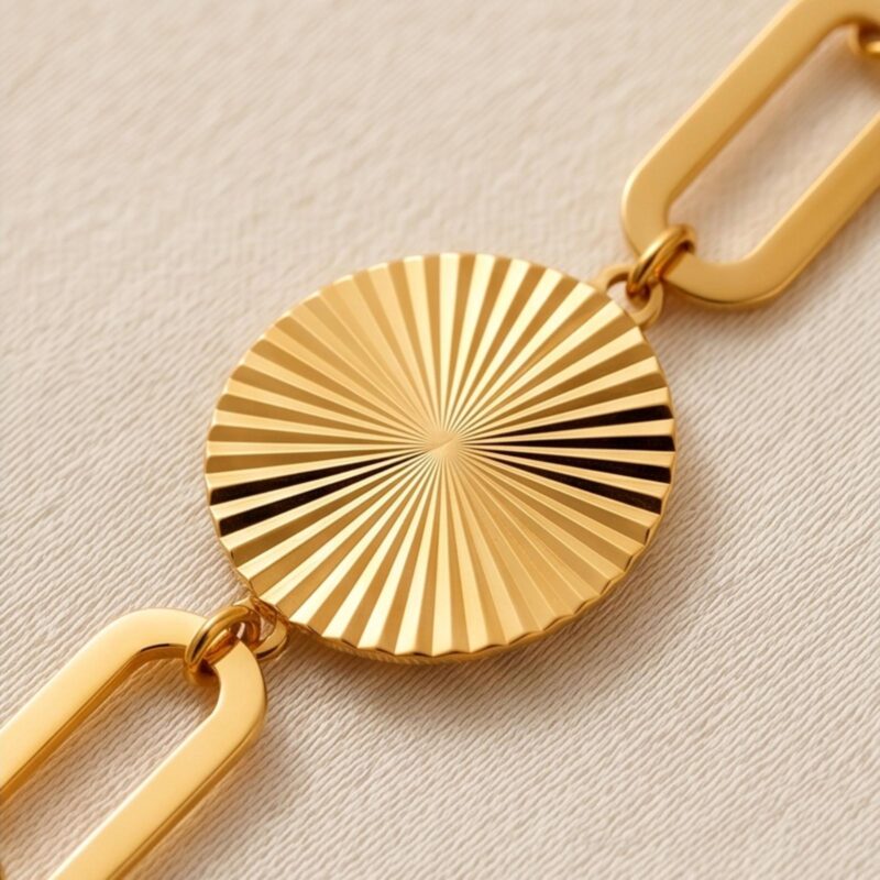 Alternative view of 21K lightweight gold bracelet featuring a radiant textured sunburst heart charm and modern paperclip links crafted for effortless everyday luxury by Bafleh Jewellery
