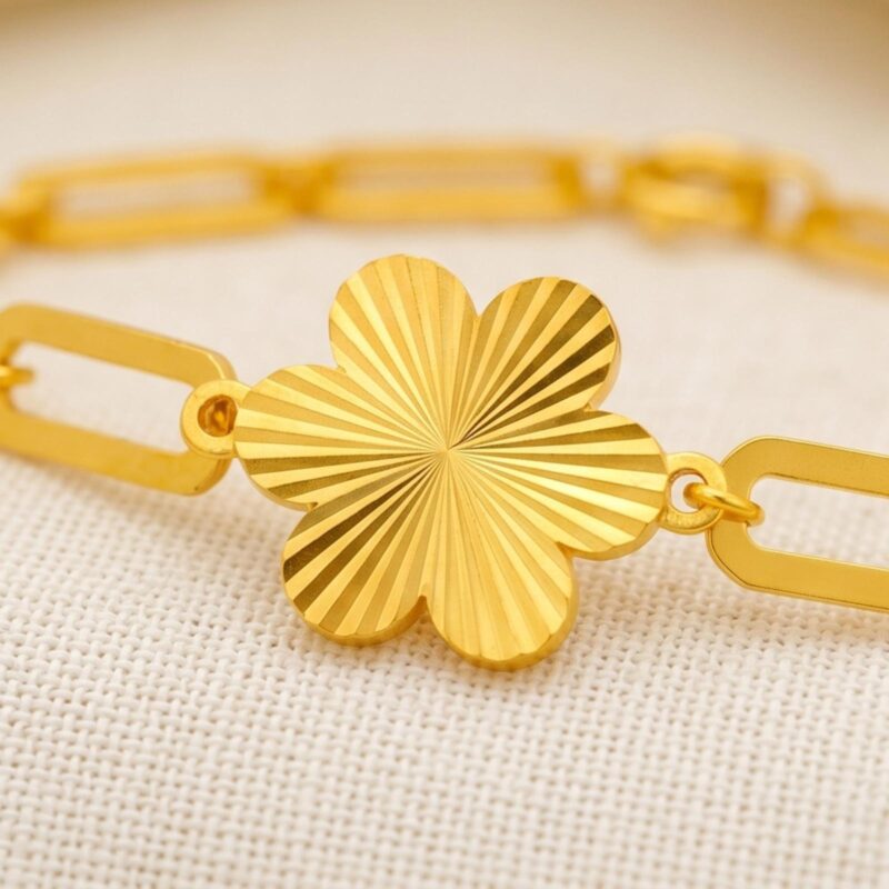 Alternative view of Upgrade your wristwear with a brilliant fluted finish. Our lightweight 21K gold bracelets combine modern geometric link styles with delicate nature inspired motis.