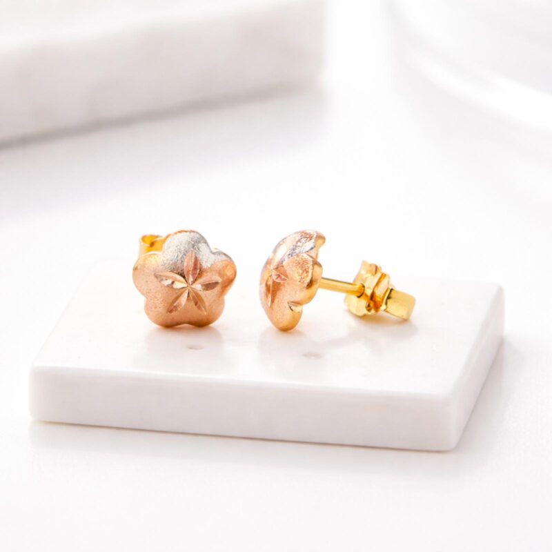 Redefine elegance with intricately designed 22K gold earrings crafted for modern women