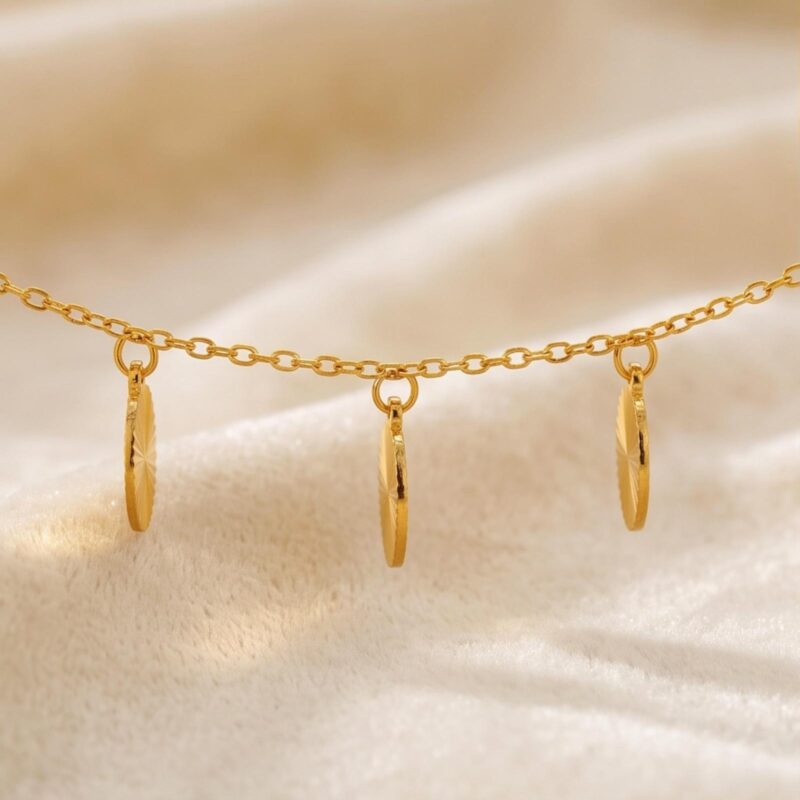 Alternative view of 21K Gold Charm Bracelet with Textured Sunburst Oval Discs by Bafleh Jewellery