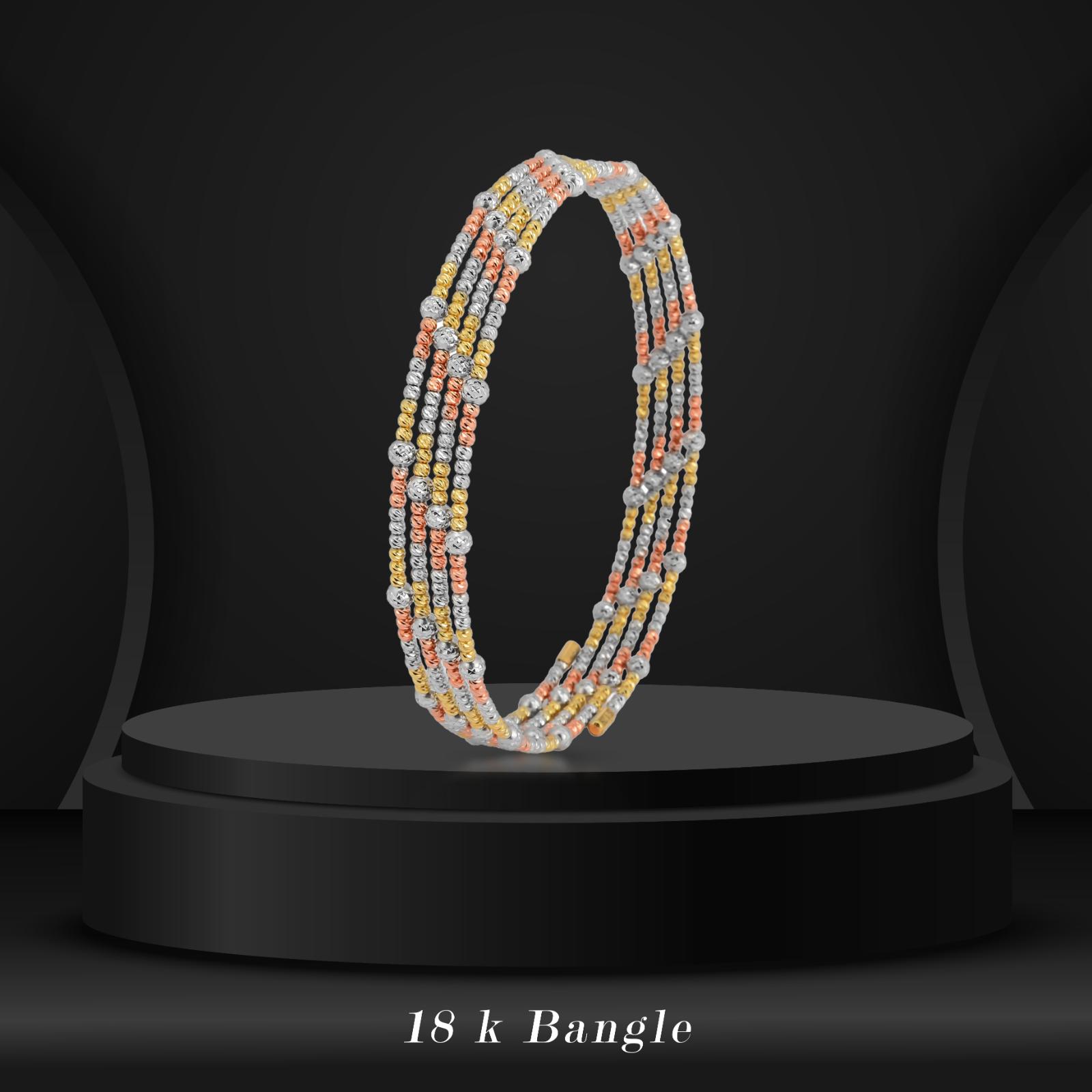Elevate Your Elegance with the Stunning Spring Bangle Featuring Beats Design in 18K Gold Exclusively at Bafleh Jewellery - Image 4