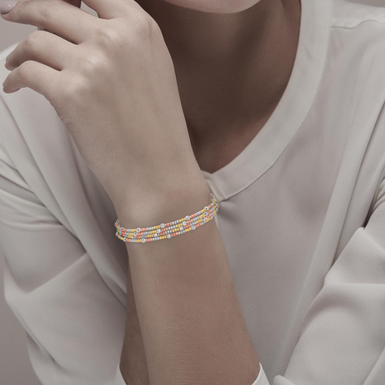 Elevate Your Elegance with the Stunning Spring Bangle Featuring Beats Design in 18K Gold Exclusively at Bafleh Jewellery - Image 3