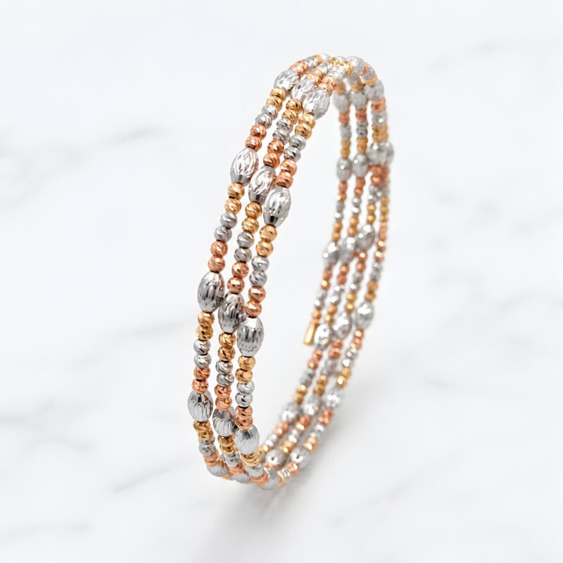 Alternative view of Add a Touch of Luxury to Your Look with the Exquisite Spring Bangle in 18K Gold with Intricate Beats Detailing