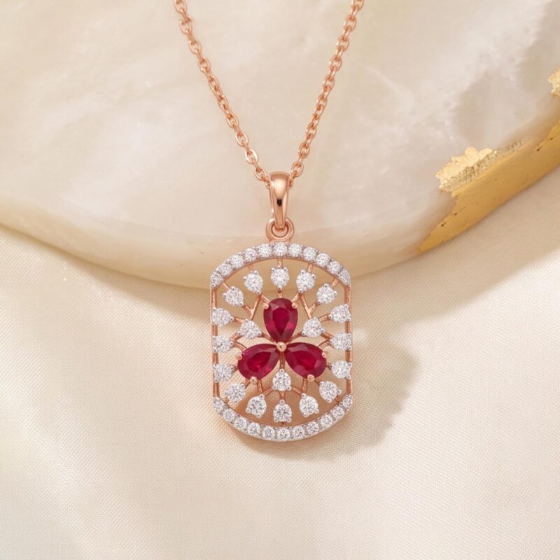 Discover an exquisite diamond necklace featuring a captivating ruby stone, beautifully crafted in 18K gold at Bafleh Jewellery.
