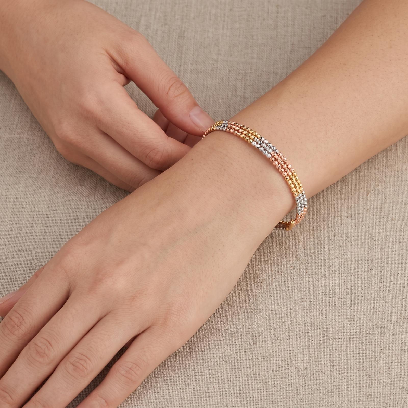 Elevate Your Elegance with the Stunning Spring Bangle Featuring Beats Design in 18K Gold Exclusively at Bafleh Jewellery - Image 4