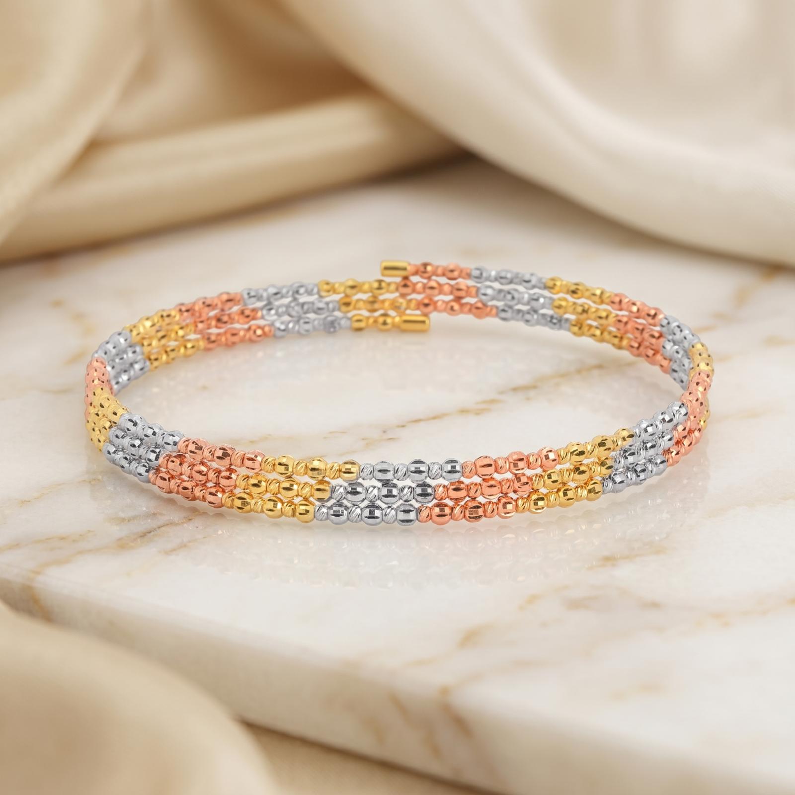 Elevate Your Elegance with the Stunning Spring Bangle Featuring Beats Design in 18K Gold Exclusively at Bafleh Jewellery - Image 3