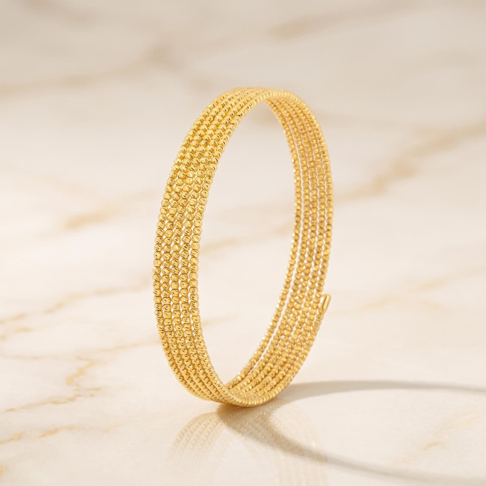 Where Timeless Beauty Meets Modern Simplicity Lightweight 18K Gold Bangle Available Only at Bafleh Jewellery