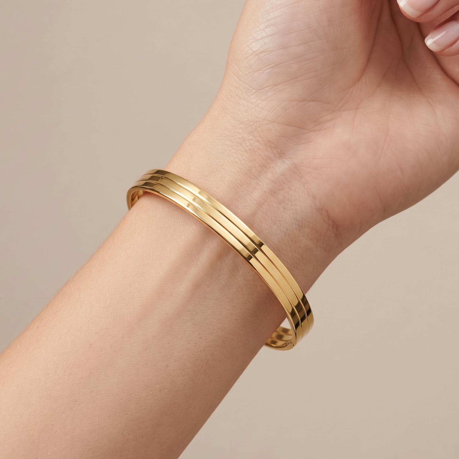 Luxury 18K Gold Bangle Designed for Modern Elegance and Classic Beauty Available from Bafleh Jewellery - Image 2